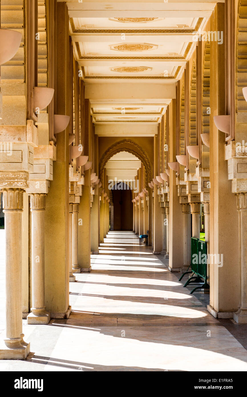 Colonnaded walkway beside the Grand Mosque of Hassan II in Casablanca ...