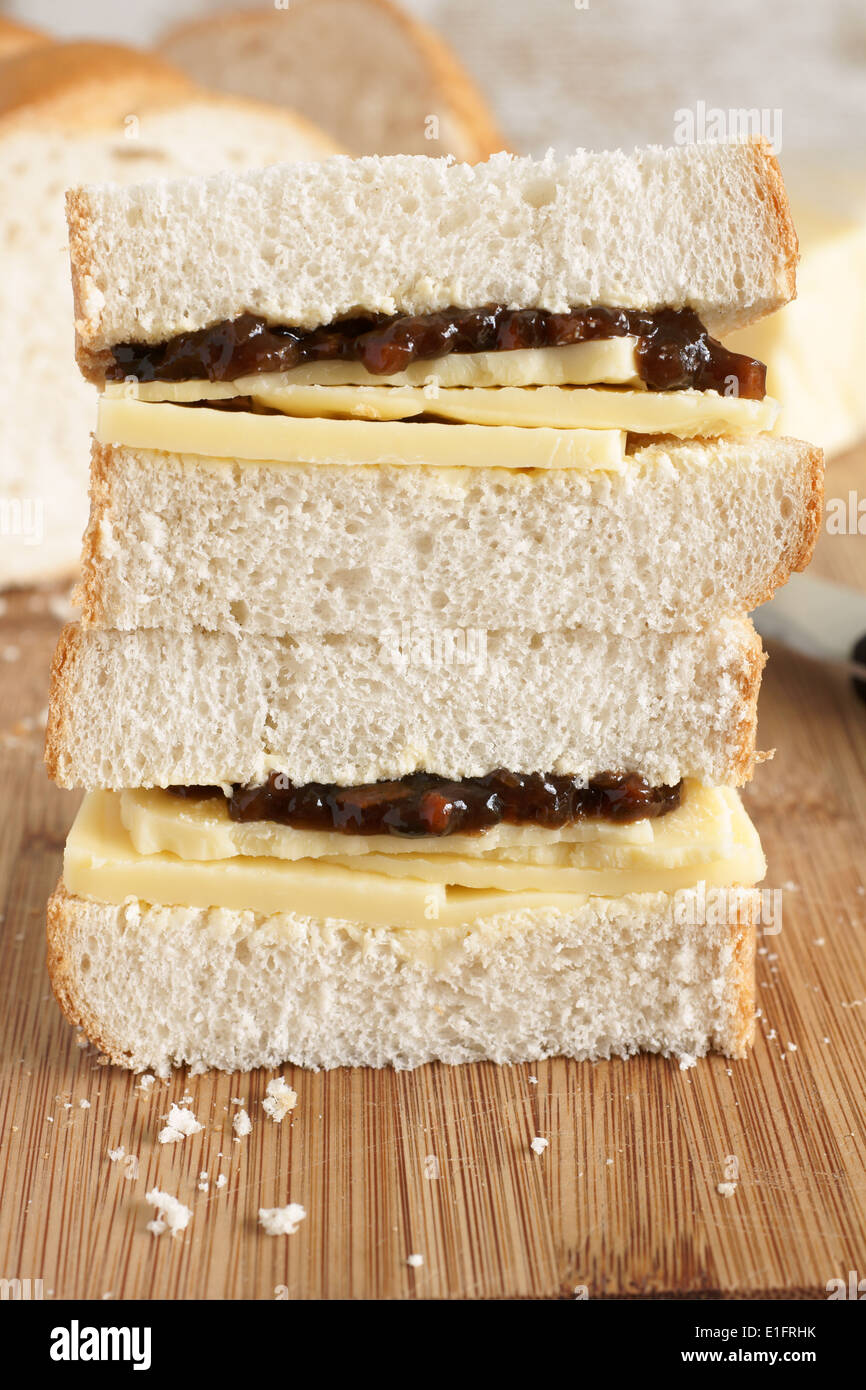 Rustic style hand cut Cheddar cheese and pickle sandwich made with home made bread Stock Photo