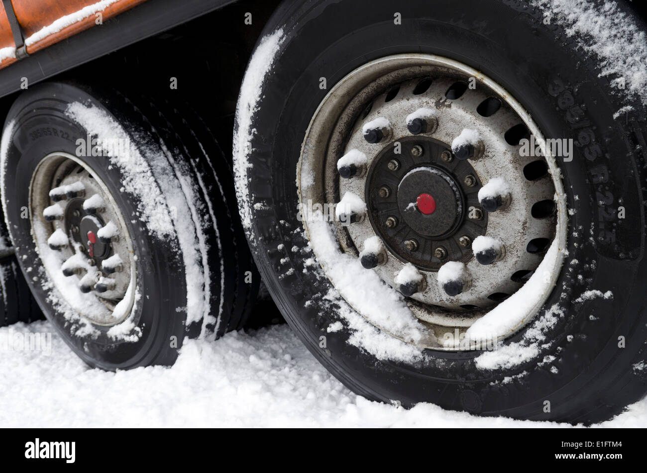 wheels of a parked trailer in winter Stock Photo