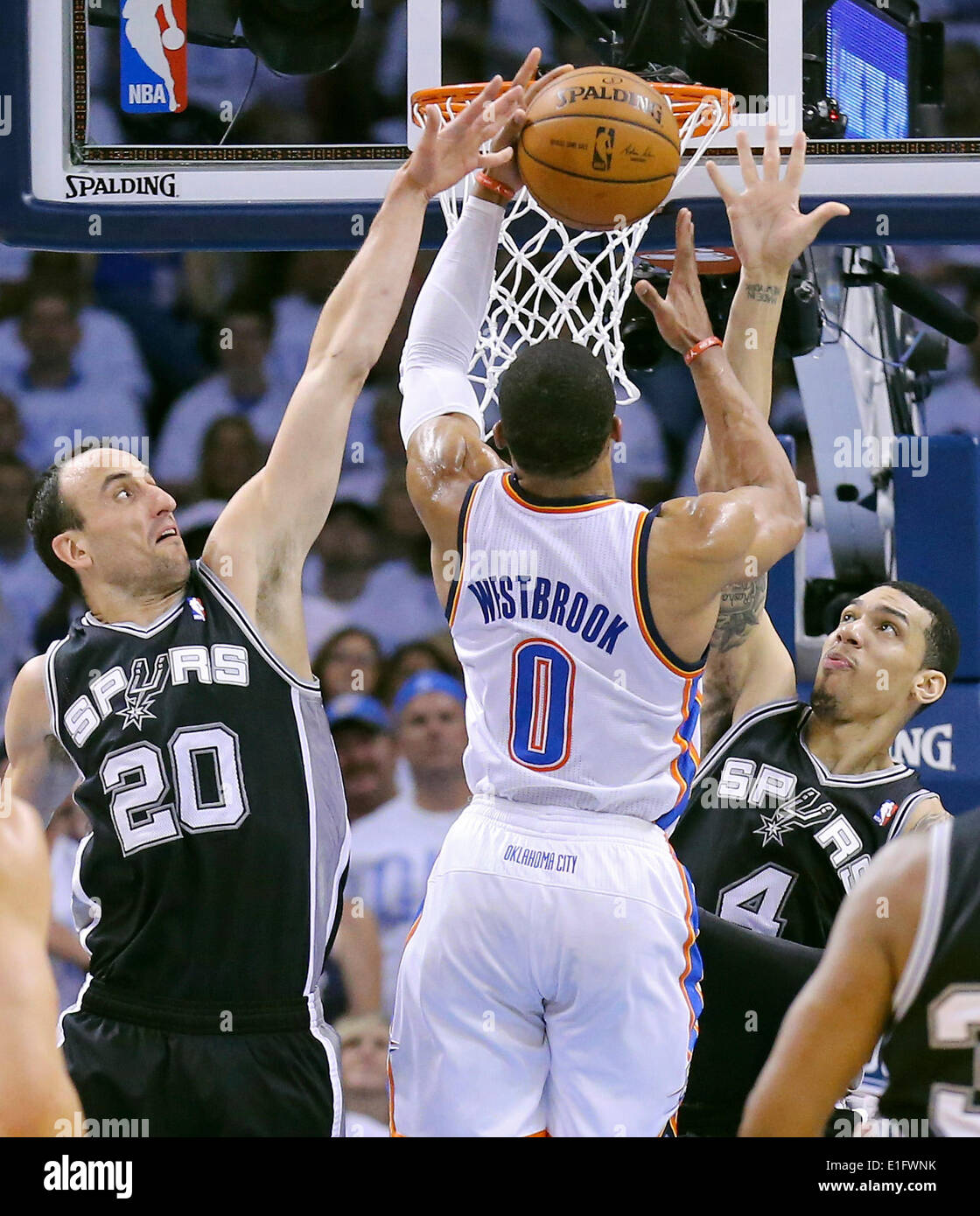 May 31, 2014 - Oklahoma City, OKLAHOMA, USA - San Antonio Spurs' Manu Ginobili and Danny Green defend Oklahoma City Thunder's Russell Westbrook during first half action in Game 6 of the Western Conference finals Saturday May 31, 2014 at Chesapeake Energy Arena in Oklahoma City, OK. (Credit Image: © San Antonio Express-News/ZUMAPRESS.com) Stock Photo