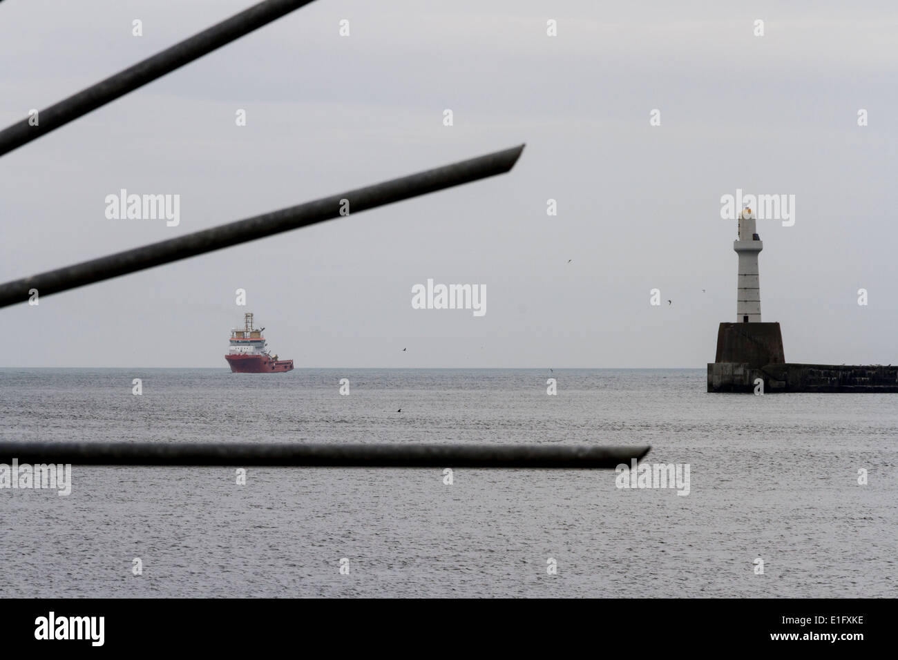 North sea oil platform supply vessel approaching Aberdeen harbour Stock Photo