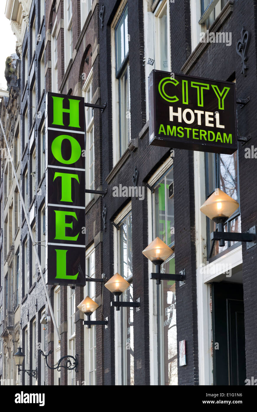 hotel sign of the city hotel amsterdam. A two-star family hotel in an 18th century building located in the center of Amsterdam Stock Photo