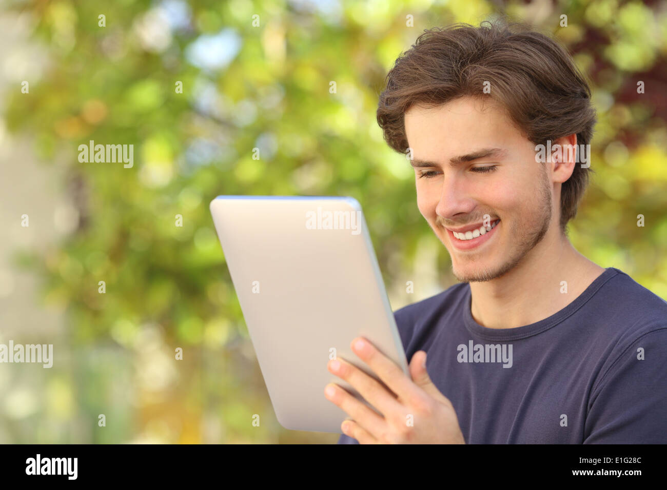 Tablet using with green background hires stock photography and images