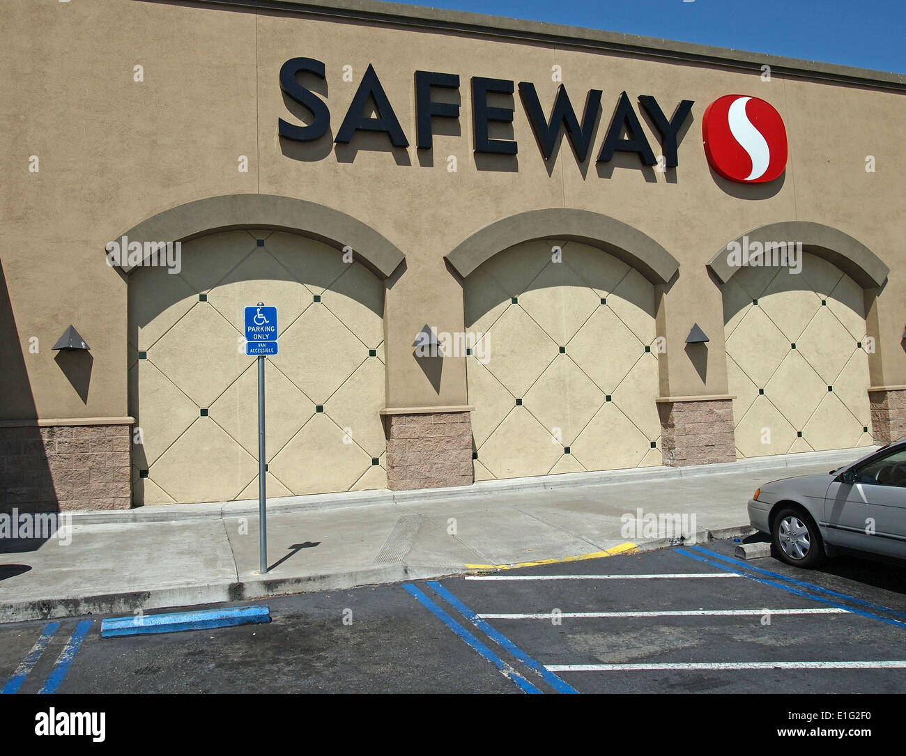 Handicapped symbol parking space at Safeway store Stock Photo