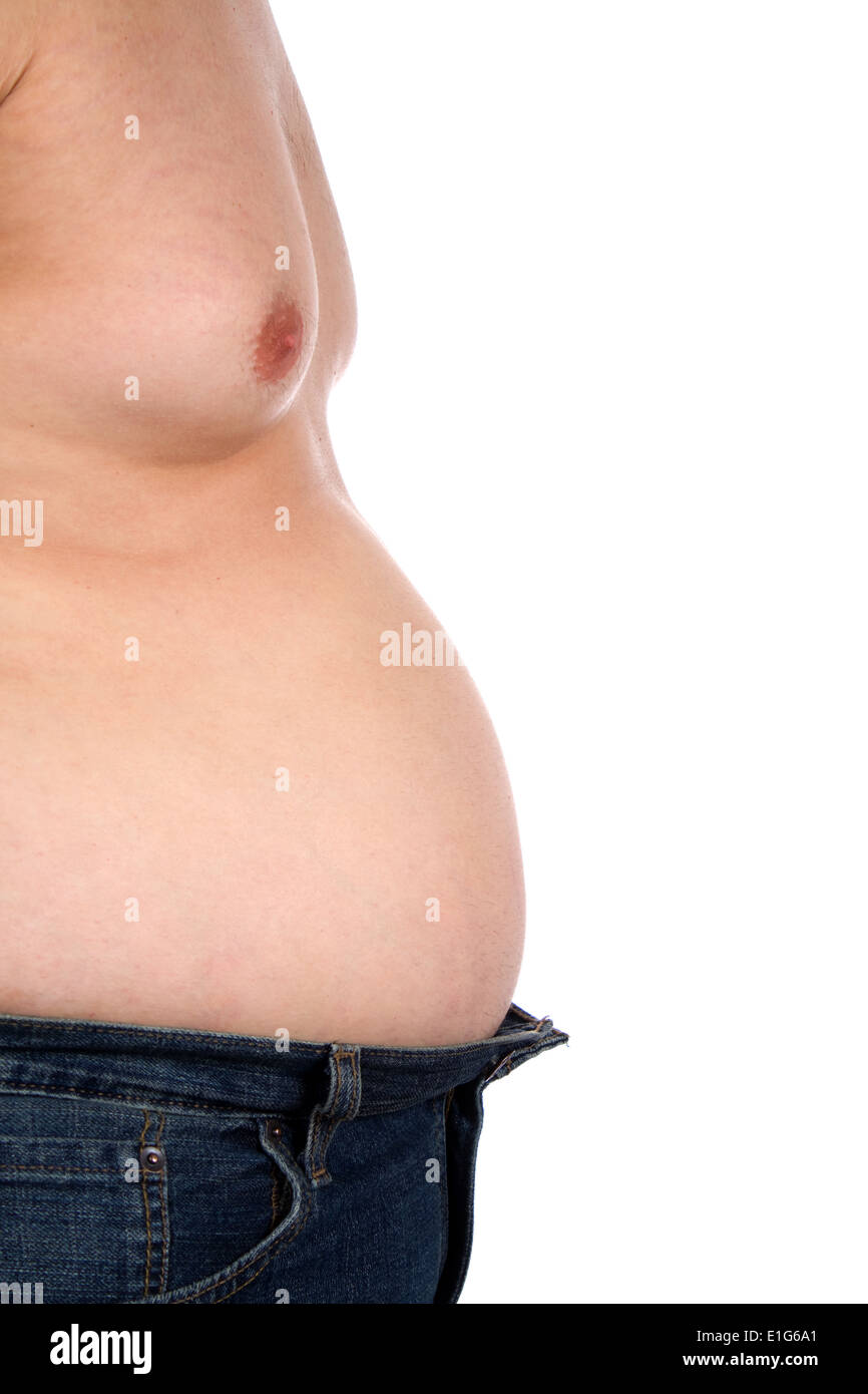 Man with a big beer belly is shown from a side view. Stock Photo