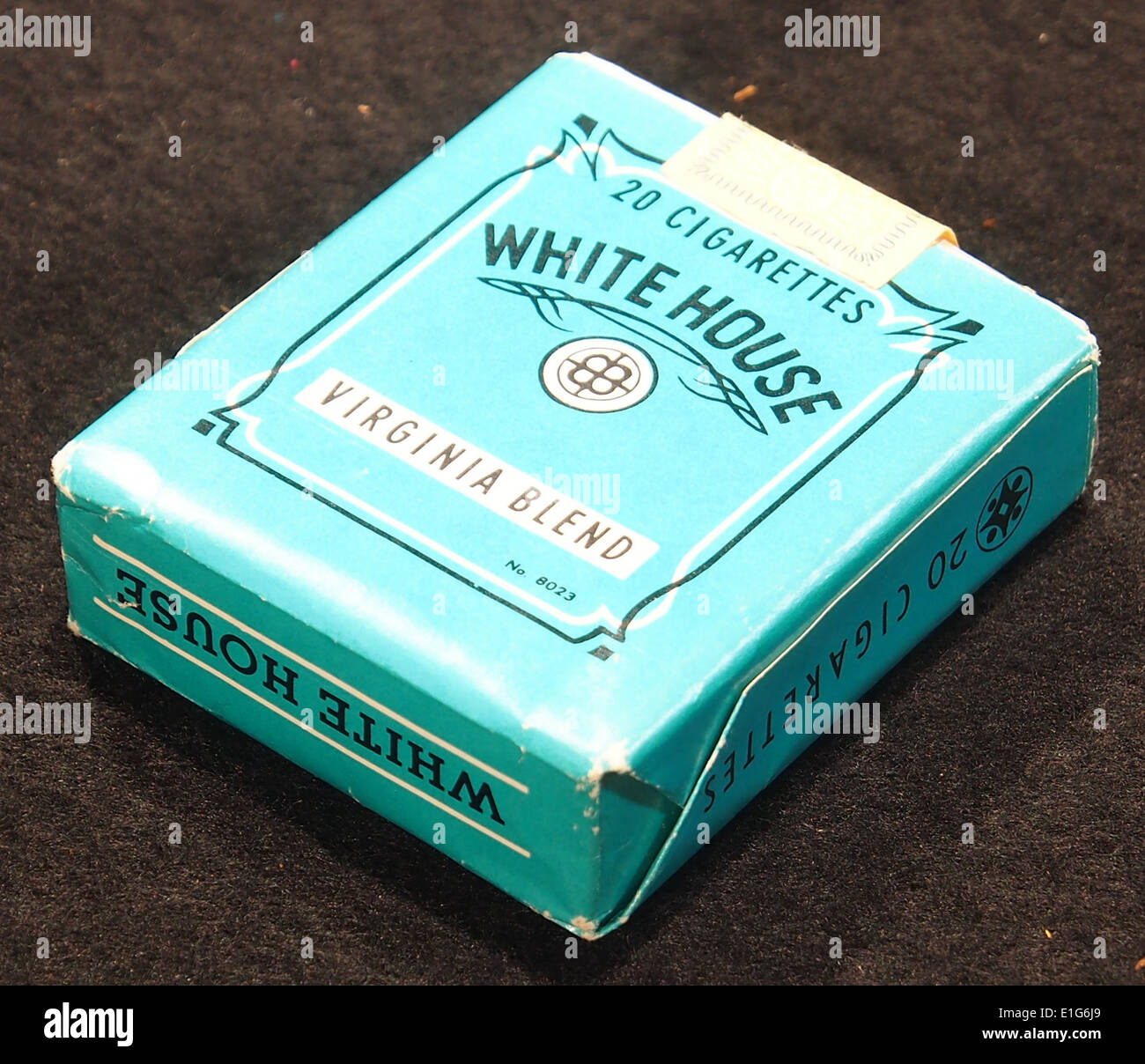 all white cigarettes brand A pack of White House cigarettes, a brand known for its tobacco products.  This packaging represents the brand's vintage design and market positioning  in the tobacco industry Stock Photo