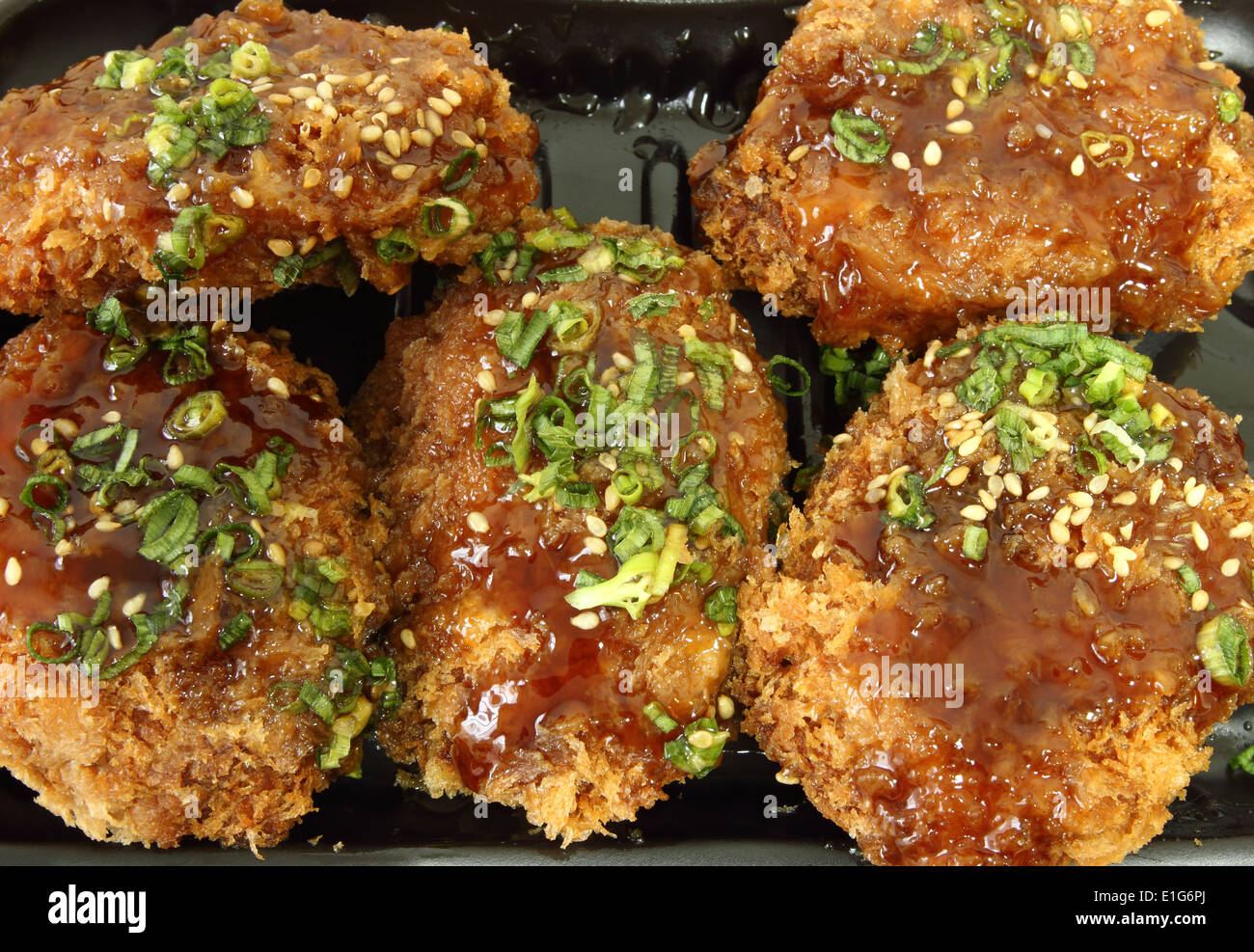 chicken Milanese with Teriyaki sauce Stock Photo