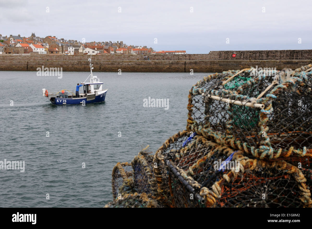 Lobster fishing from a small boat hires stock photography and images
