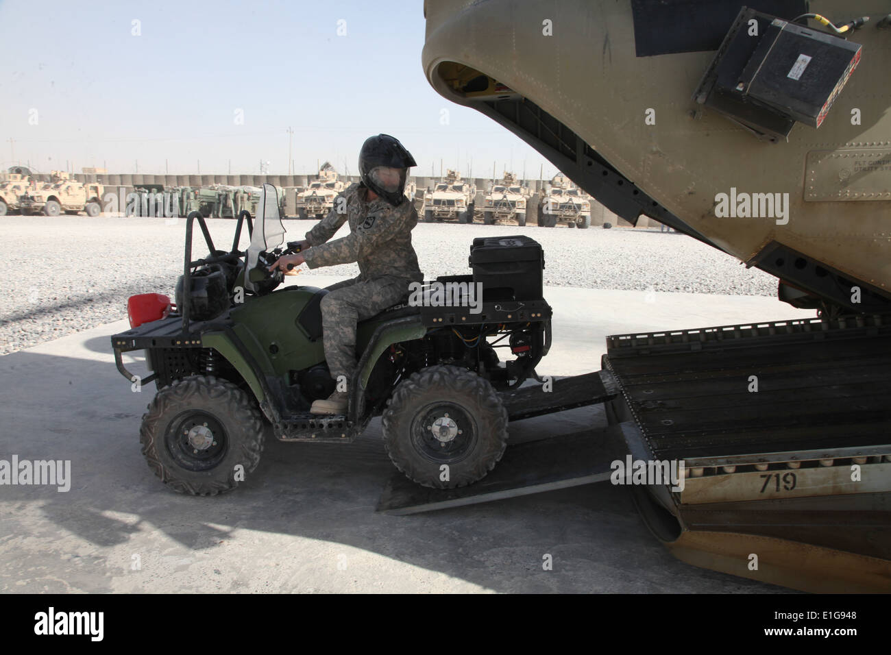 U.S. Army Sgt. Maj. Travis Votaw backs a Polaris allterrain vehicle