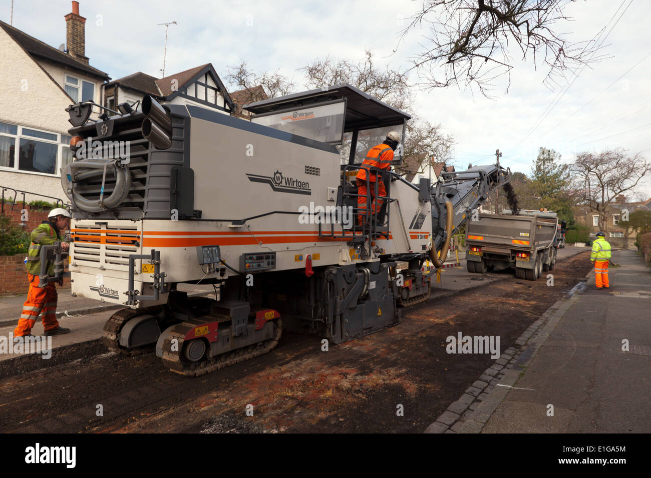 view of a Wirtgen W 2100 Cold Milling Machine at work, removing the