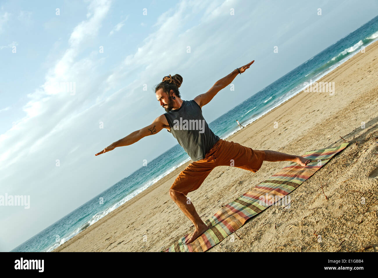 Beach yoga poses hi-res stock photography and images - Alamy