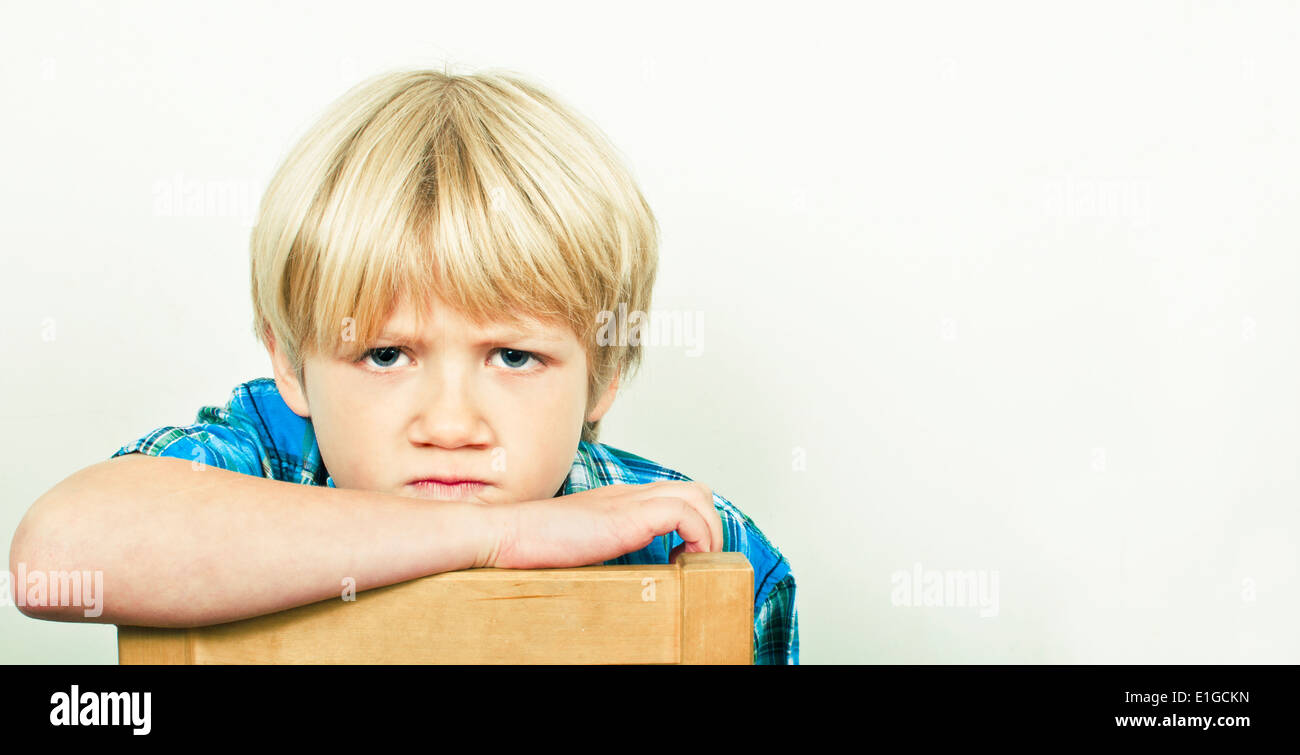 Angry and aggressive child Stock Photo