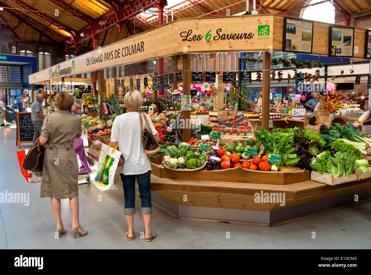 Stand for fruits and vegetables on the green market in the market hall of Colmar, Alsace, France Stock Photo
