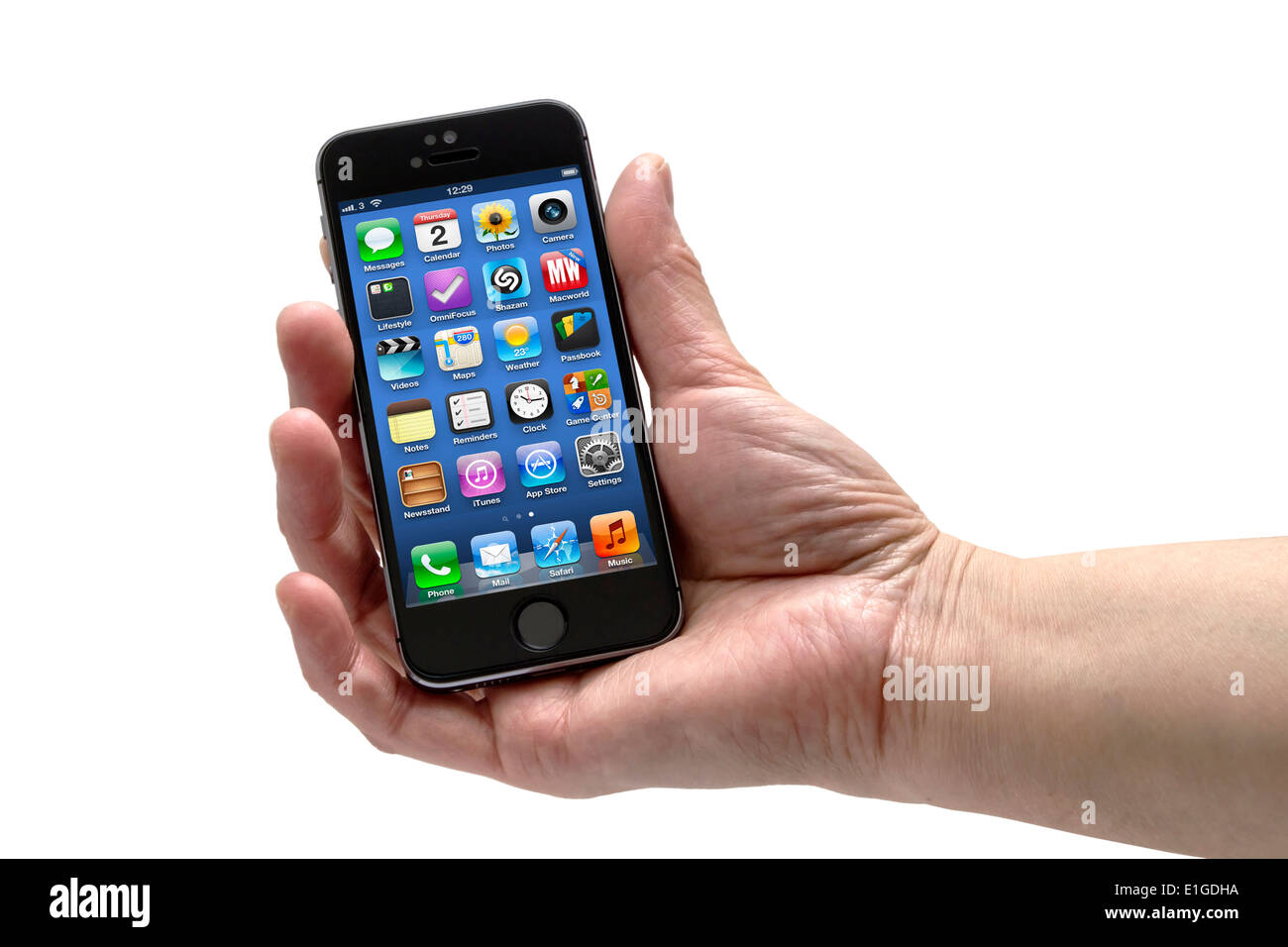 Iphone in a womans hand Stock Photo
