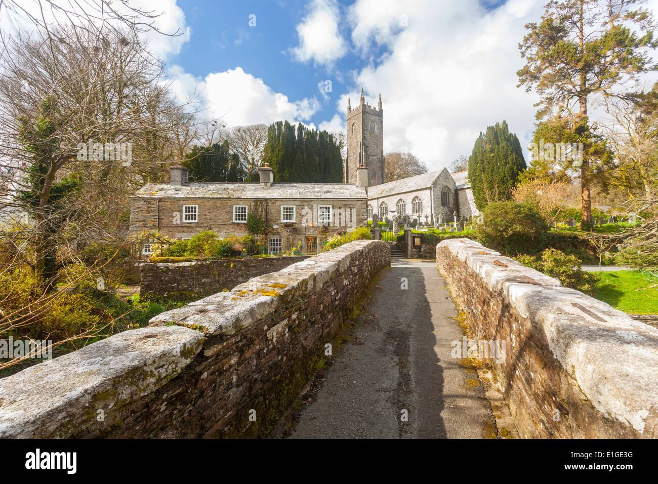 The Church of St Nonna and Pack Horse bridge at Altarnun on Bodmin Moor Cornwall England UK Europe Stock Photo