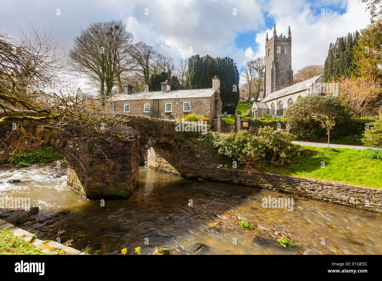 The Church of St Nonna and Pack Horse bridge at Altarnun on Bodmin Moor Cornwall England UK Europe Stock Photo