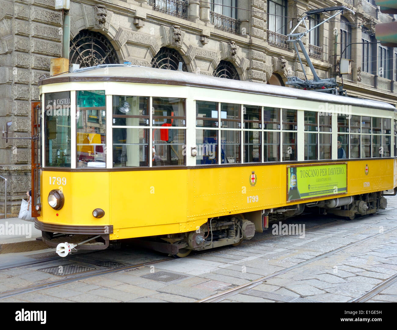 Vintage yellow streetcar in Milan, italy Stock Photo