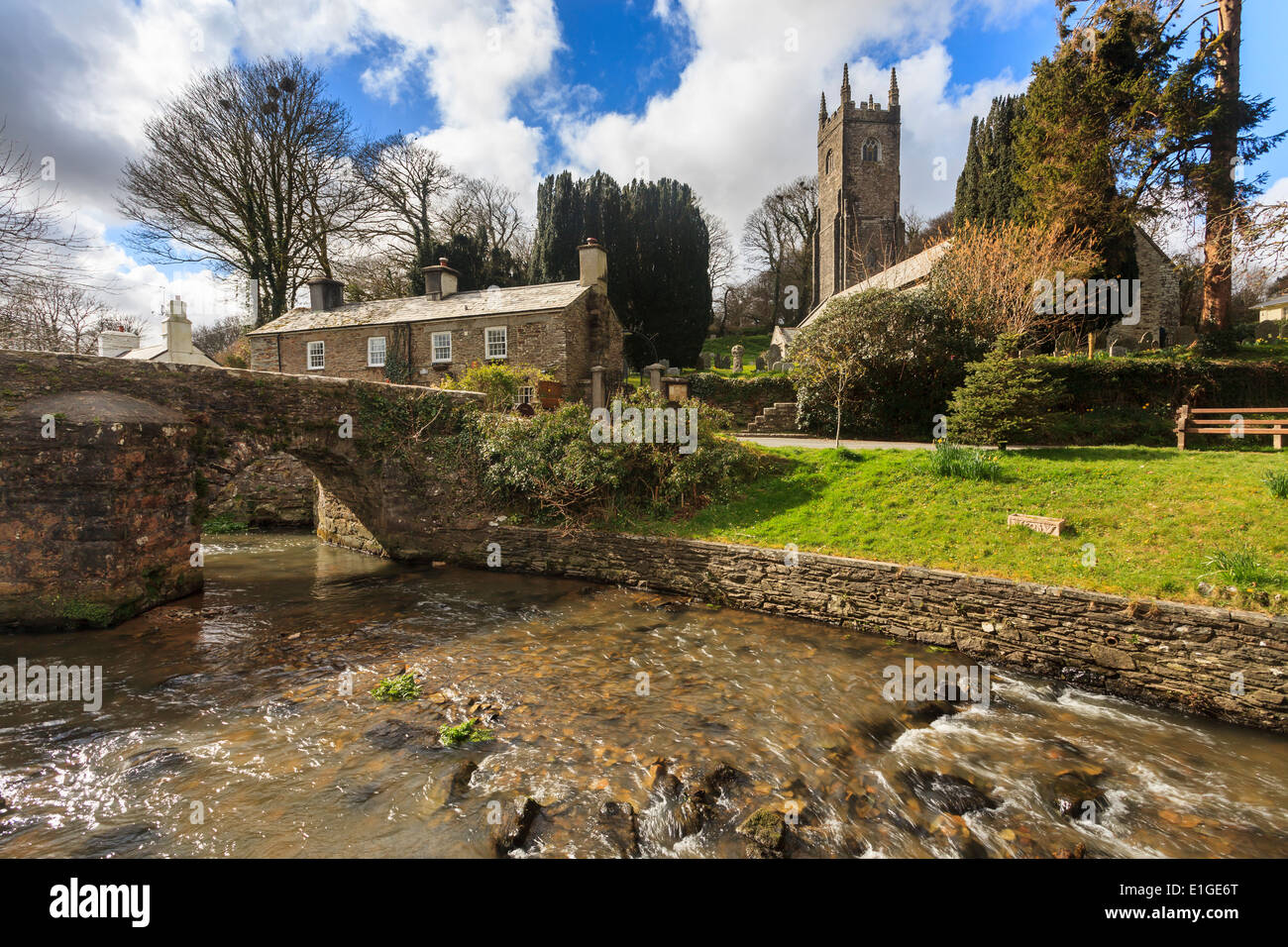 The Church of St Nonna and Pack Horse bridge at Altarnun on Bodmin Moor Cornwall England UK Europe Stock Photo