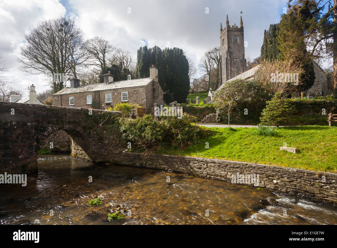 The Church of St Nonna and Pack Horse bridge at Altarnun on Bodmin Moor Cornwall England UK Europe Stock Photo