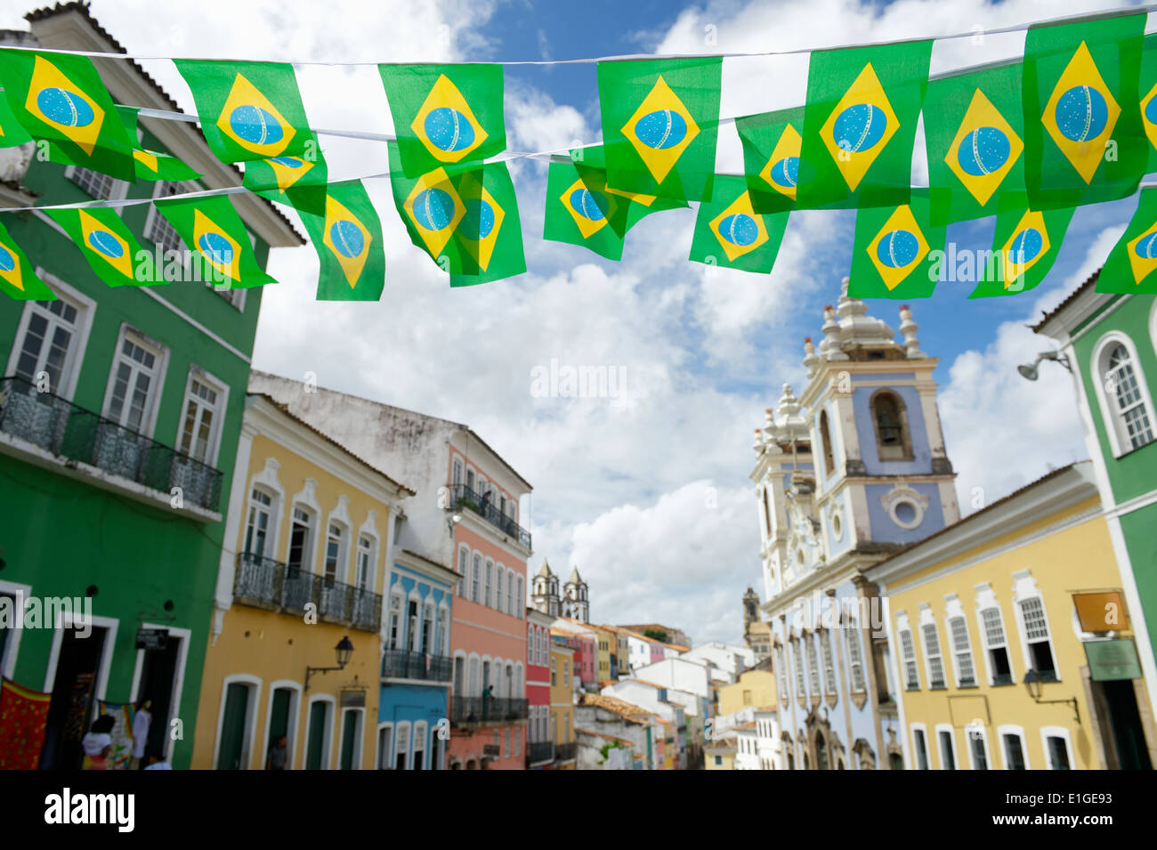 Brazilian flag bunting fluttering over historic city center colonial architecture of Pelourinho Salvador da Bahia Brazil Stock Photo