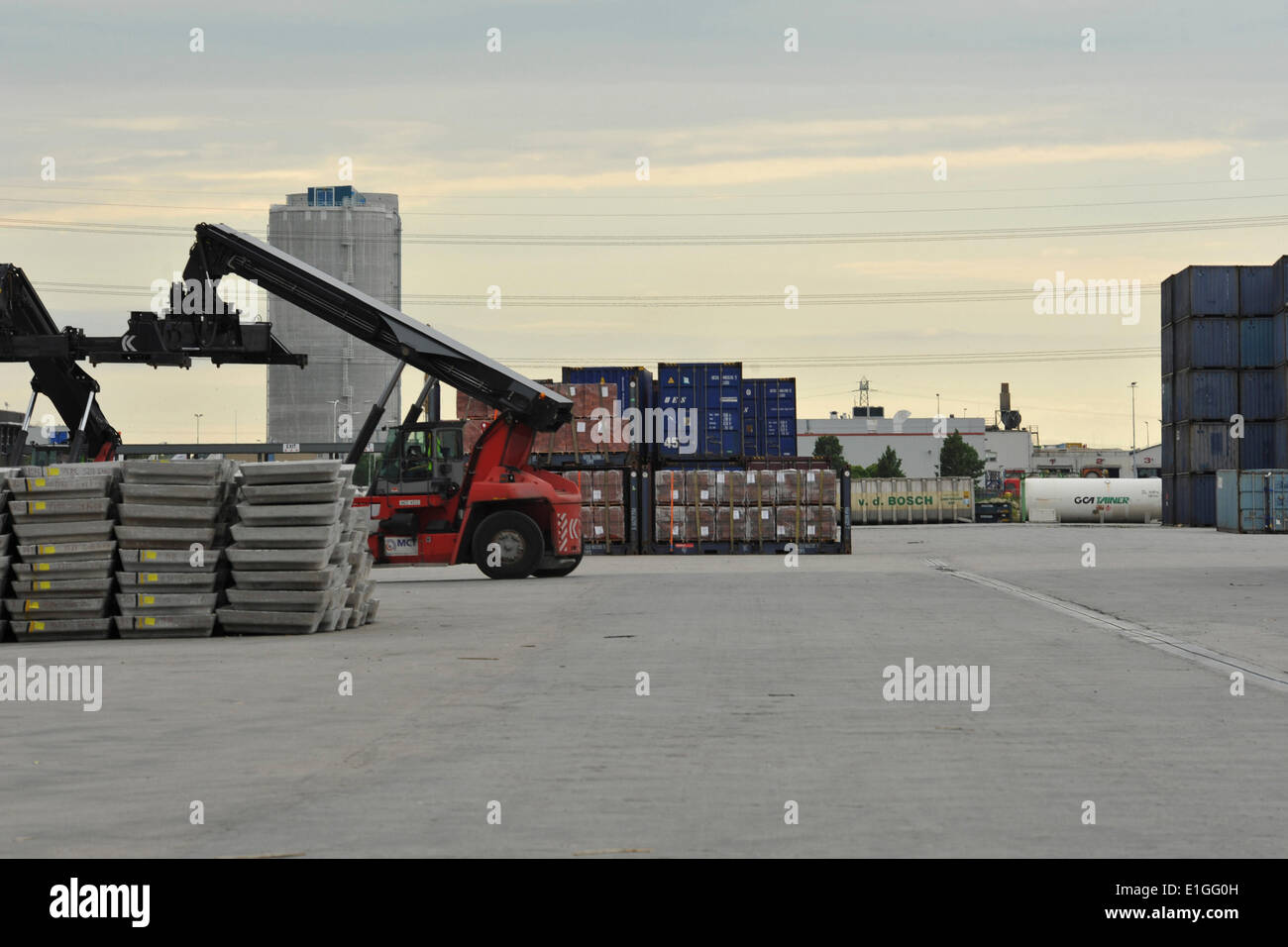 Transport of goods with reach stacker at the harbour of Moerdijk, 20 July 2012 Stock Photo