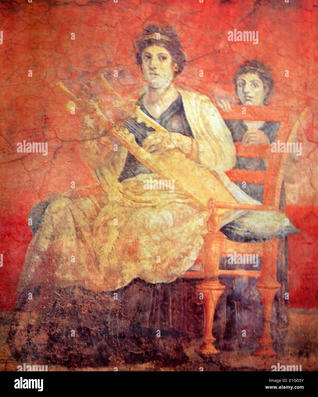 A Roman fresco, discovered in Pompeii, depicits a woman seated on a bronze chair, with a back, playing a Greek musical instrument called a Kithara. Chairs with a back for the Romans was a symbol of dignity or respect, reserved for high officials or woman of rank (the ceremonial use of thrones a vestige of this tradition) such as the woman in this fresco. Dated 50 B.C. Stock Photo