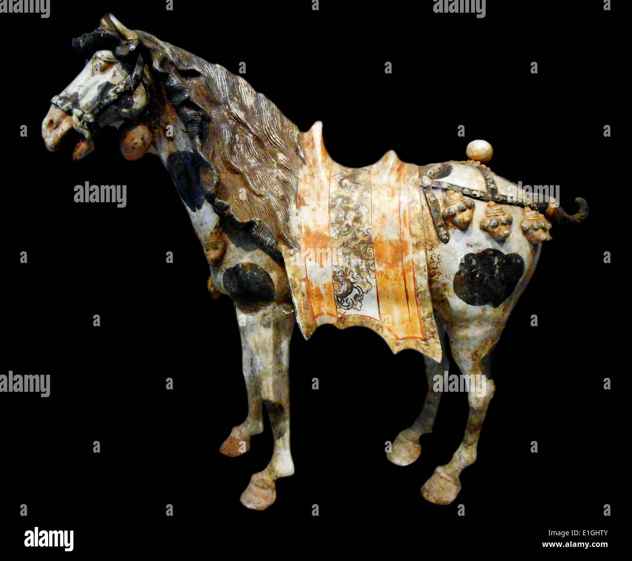 Figure of a Horse, Tang dynasty, ca. late 7th-first half of the 8th century.  Earthenware with remnants of pigments and gilt. Stock Photo