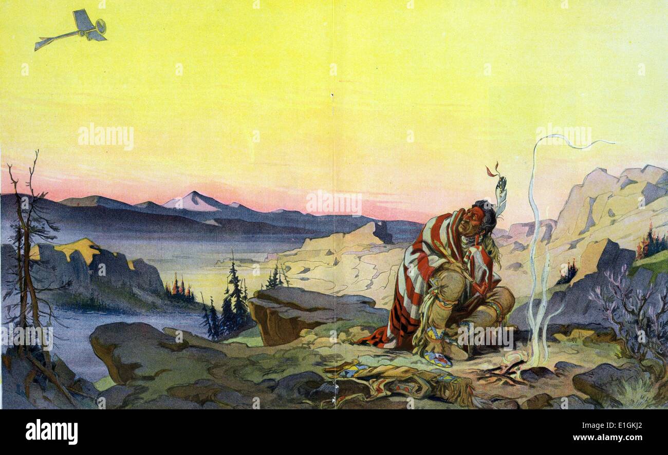 The great spirit by Udo Keppler, 1872-1956, artist 1914. Illustration shows a Native man sitting before a small fire in a wilderness setting, holding a long pipe, and with a red-striped blanket over his shoulders; he is looking back, with trepidation, over his right shoulder at a small airplane approaching (or encroaching) from the left. Stock Photo