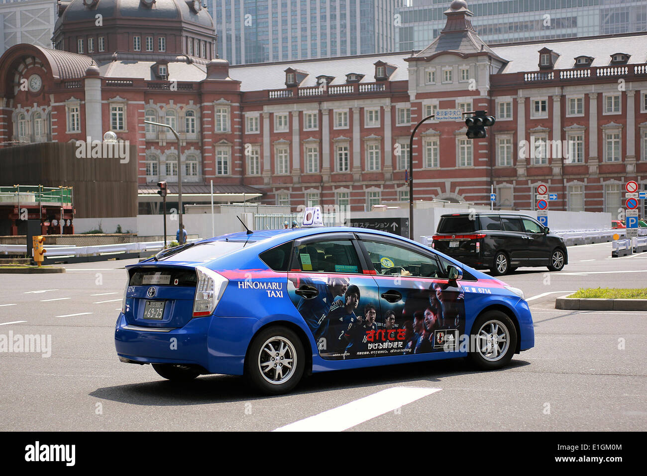 Tokyo, Japan – The 'Adidas Hinomaru-taxi' promotes the Japanese National Soccer Team a week before to start the 2014 FIFA World Cup Brazil on June 4, 2014. According to the official web site of the company Hinomaru-taxi customers can see inside the car the signs of the soccer players Shinji Kagawa, Sakai, Hiroshi Kiyotake and Uchida. © Rodrigo Reyes Marin/AFLO/Alamy Live News Stock Photo