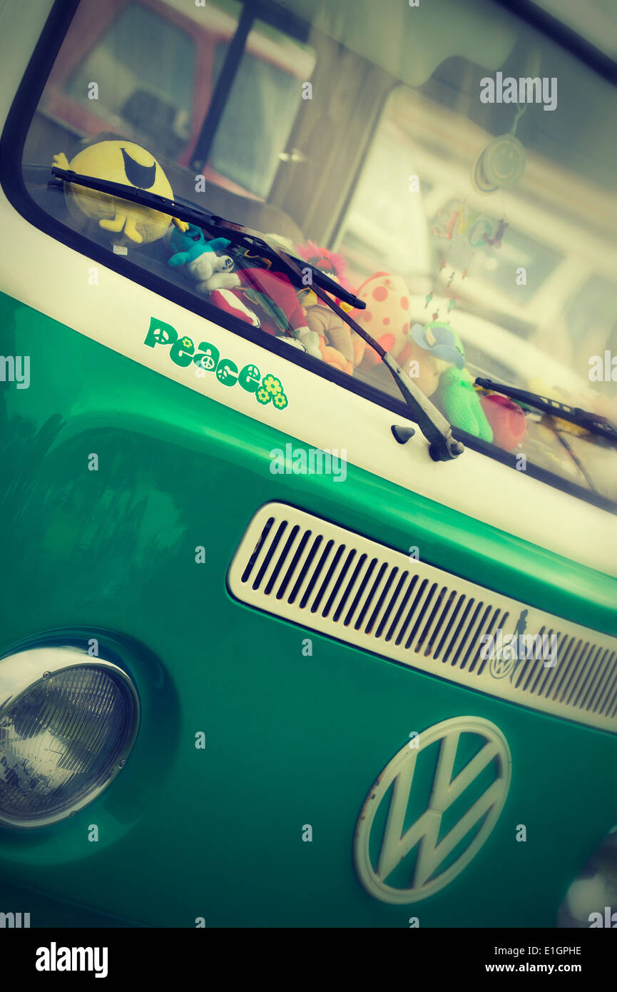 Peace sticker on the front of a VW Campervan with added nostalgic filter Stock Photo