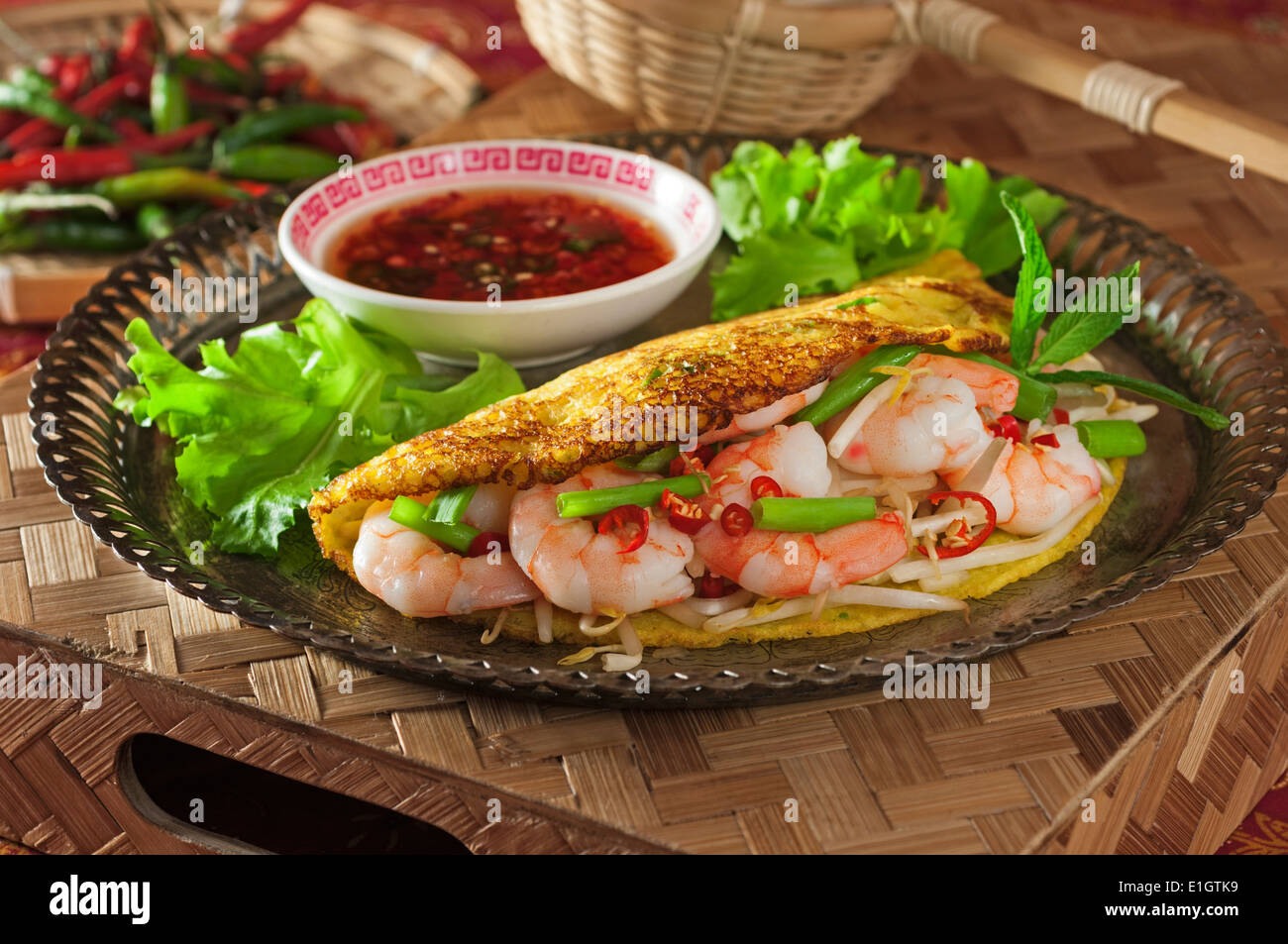 Banh Xeo. Vietnamese rice flour pancakes with prawns and bean sprouts