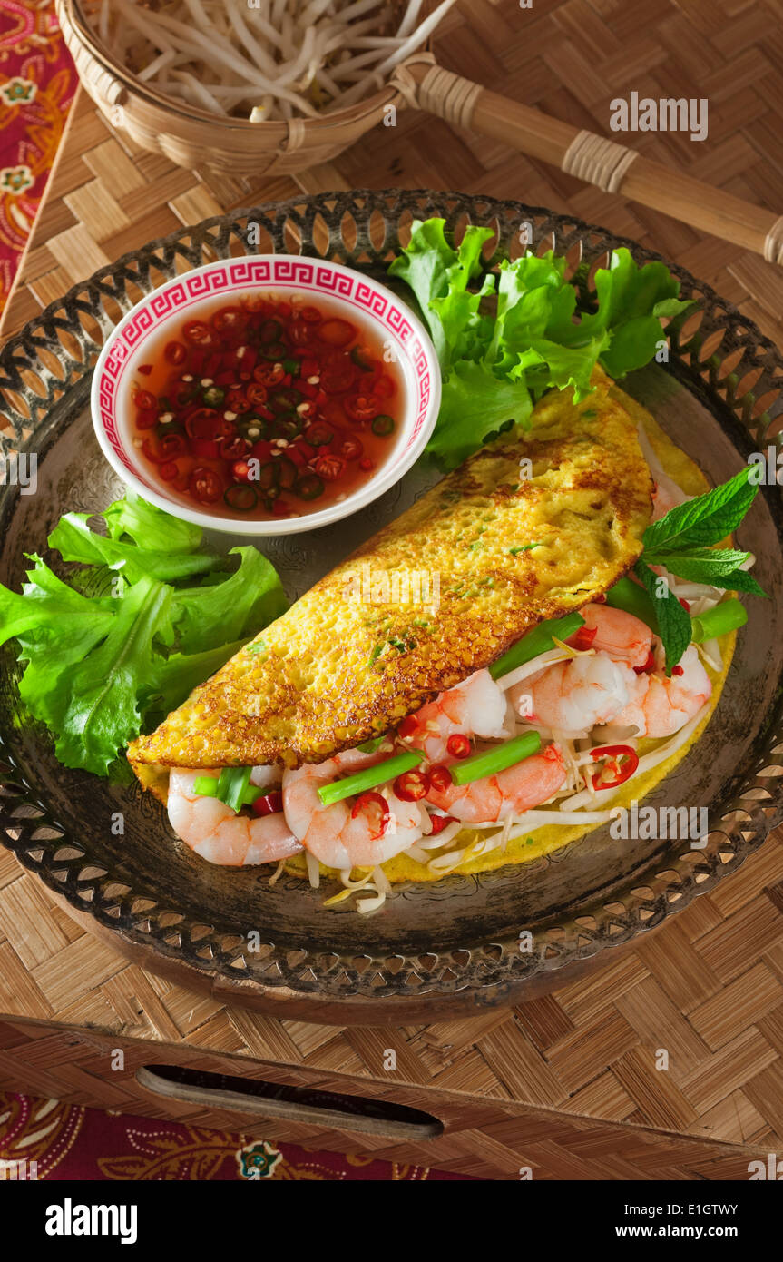 Banh Xeo. Vietnamese rice flour pancakes with prawns and bean sprouts