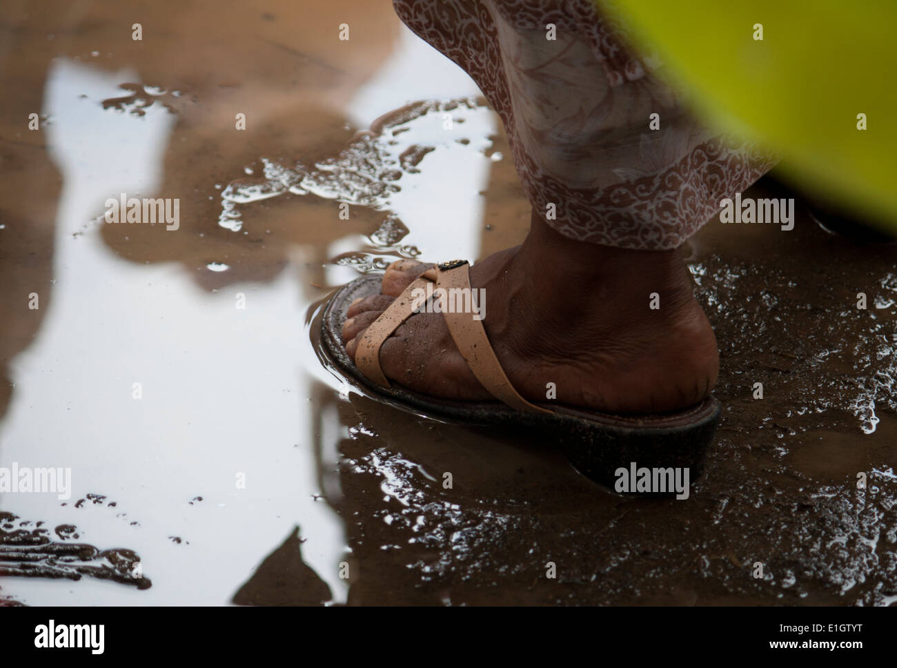 Sandaled foot in monsoon Stock Photo - Alamy
