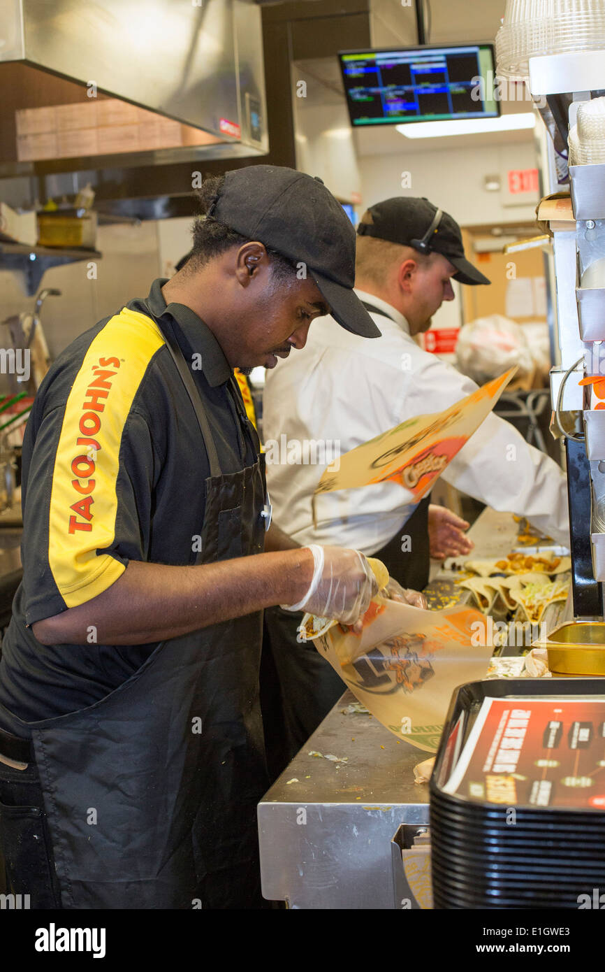 Watford City, North Dakota - Taco John's fast food restaurant, which is paying a $16-$20 starting wage for new hires. Stock Photo