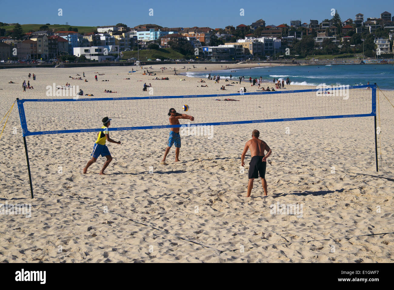 Australia's Bondi beach on a June winters day, NSW,Australia with people playing beach volleyball Stock Photo