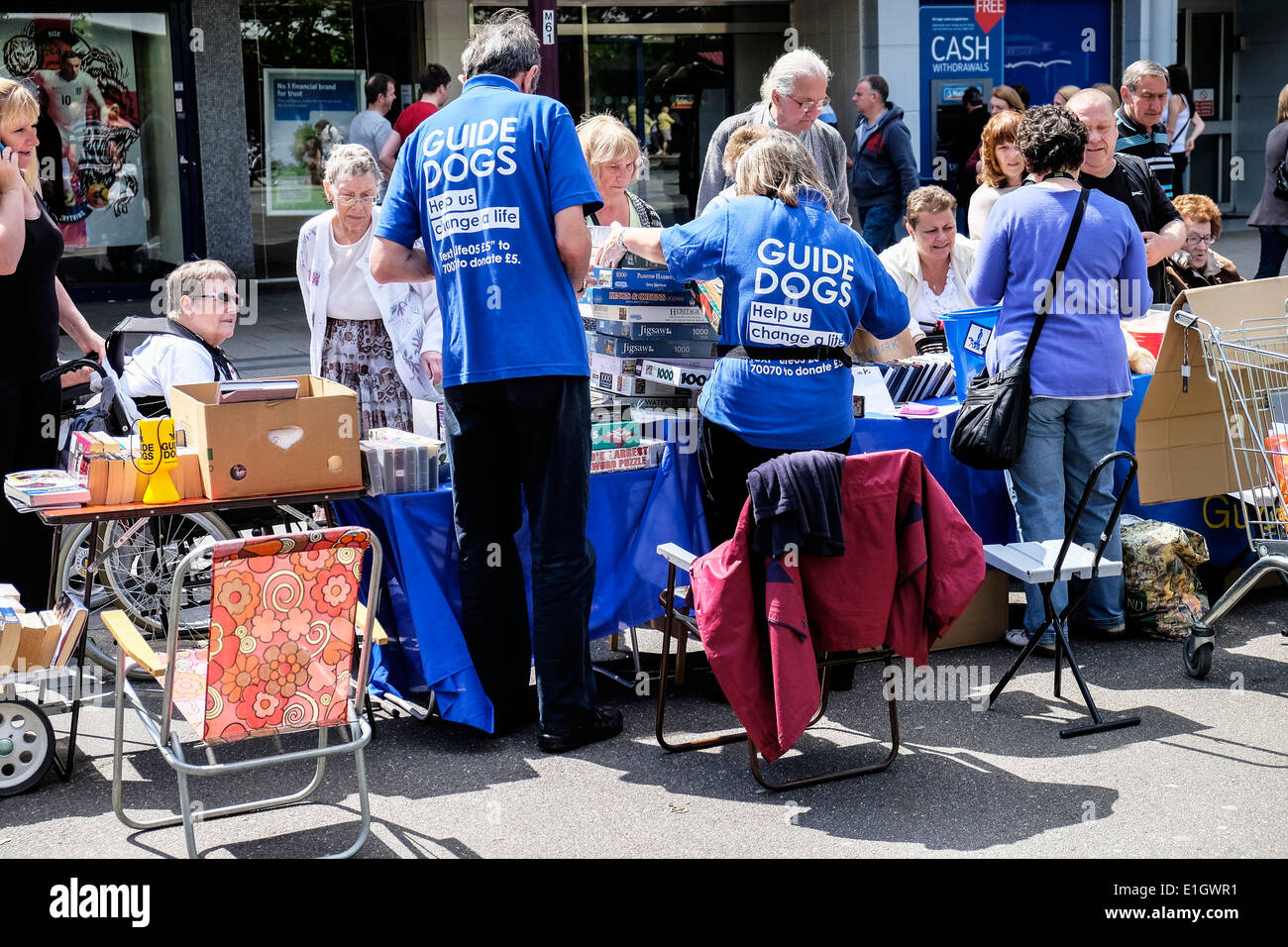 Volunteers raising funds for Guide Dogs for the Blind. Stock Photo
