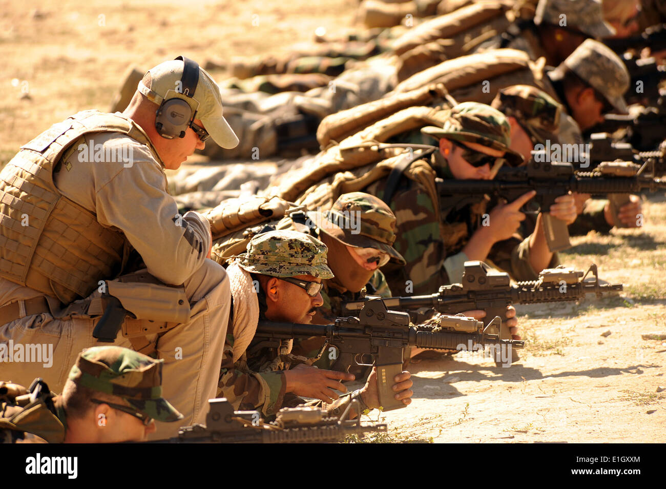 A civilian instructor from the tactical firearms training team hires