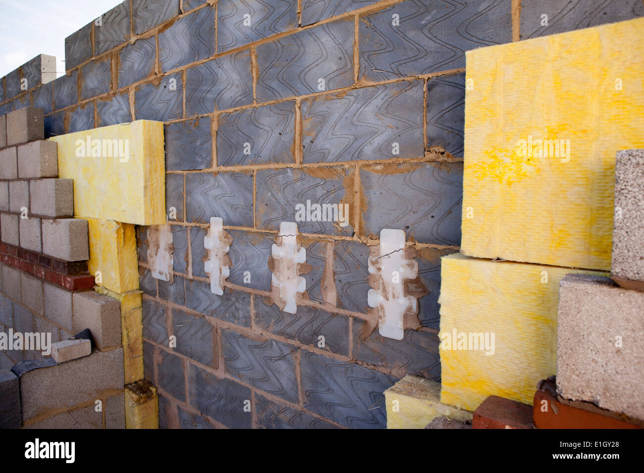 self building house, 100mm insulation bats in masonry cavity wall Stock