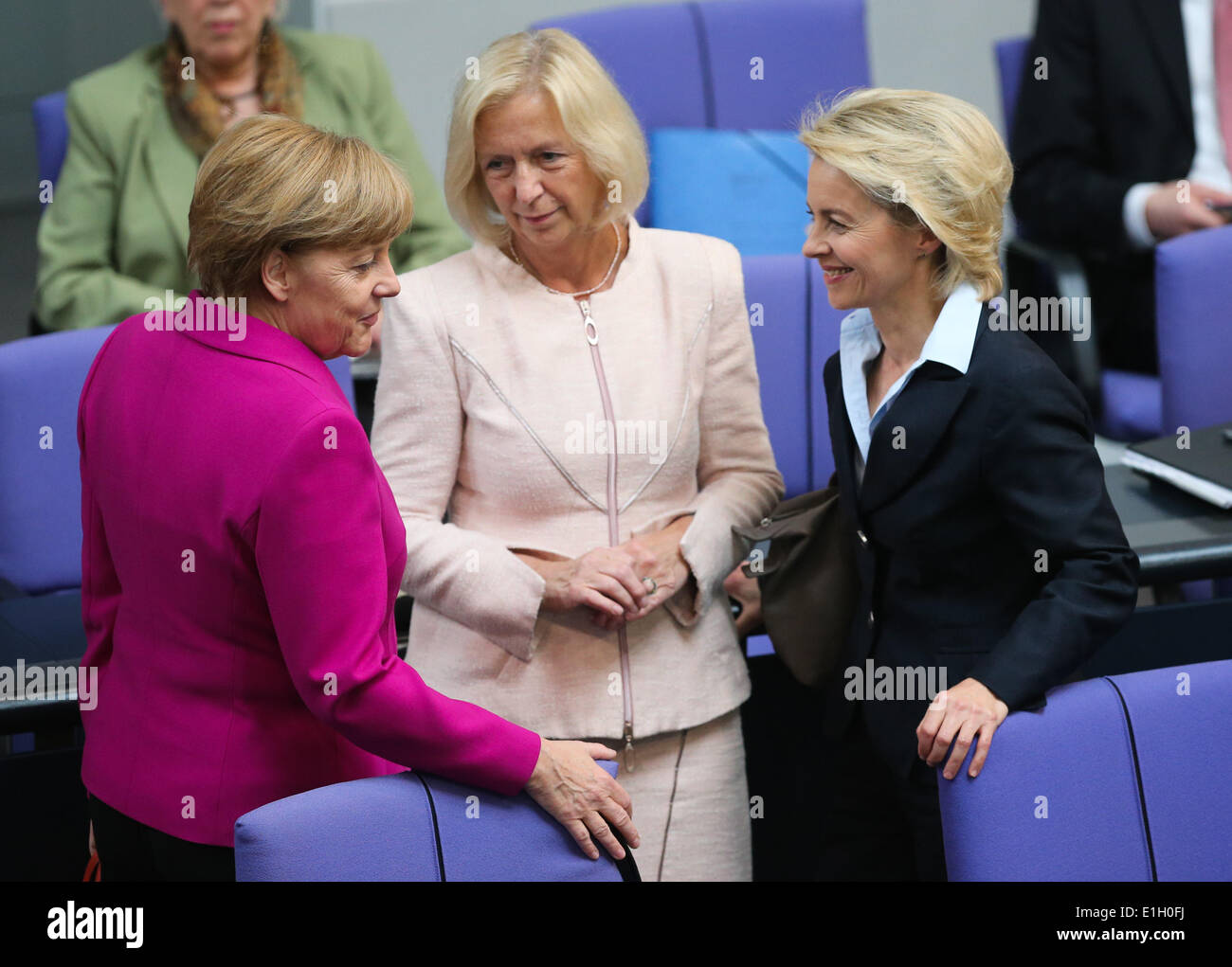 Berlin, Germany. 4th June, 2014. (L-R) German Chancellor Angela Merkel, German Education and Research Minister Johanna Wanka and German Defence Minister Ursula von der Leyen attend a meeting session at the Bundestag, the lower house of parliament, in Berlin, Germany, on June 4, 2014. The G7 Summit set for Brussels on June 4-5 will focus on Ukraine situation, ties with Russia, global economy and energy security, according to preliminary agenda unveiled by the European Union (EU). Credit:  Zhang Fan/Xinhua/Alamy Live News Stock Photo