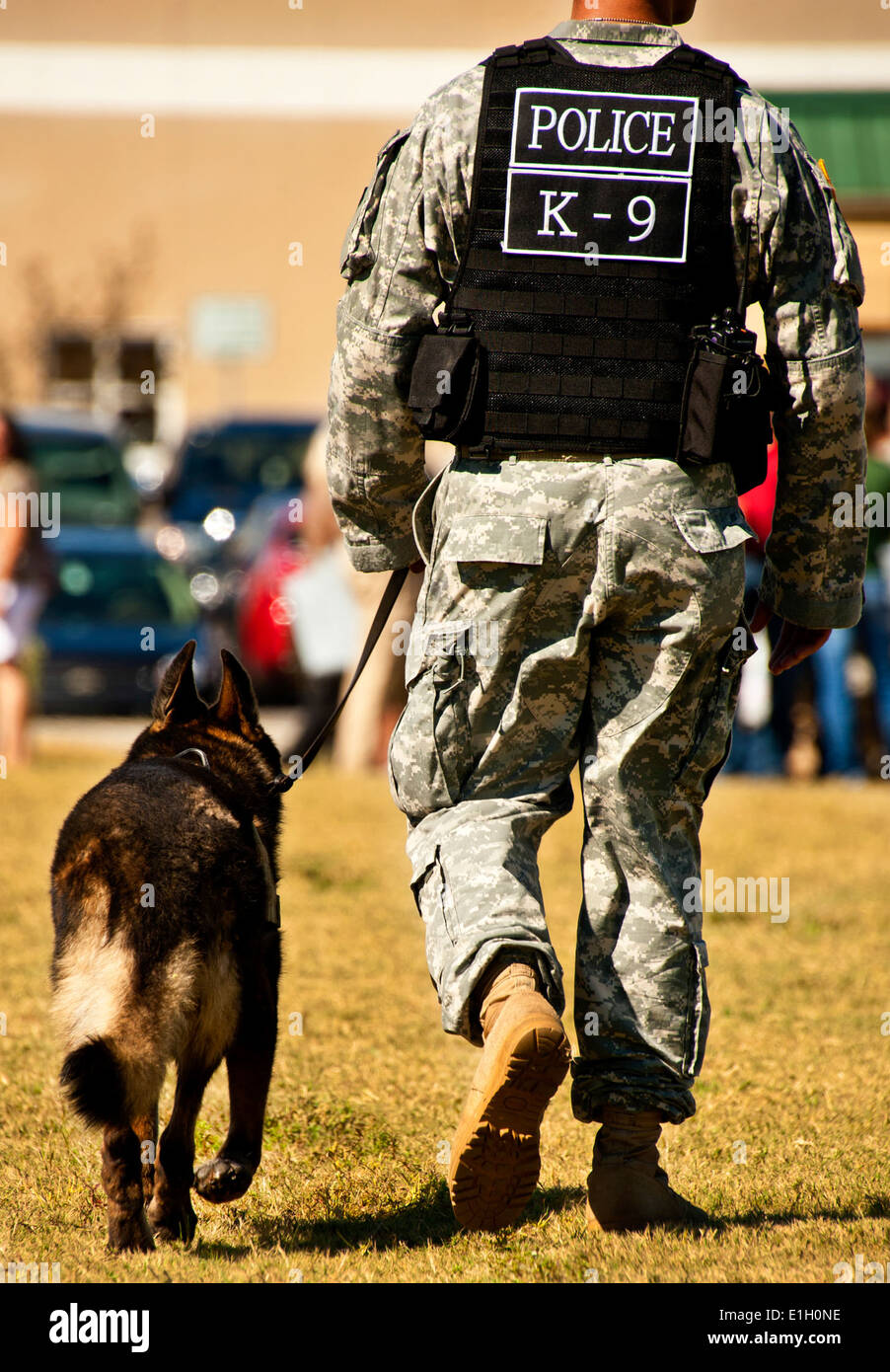 An Army K9 unit patrols the grounds during the 7th Special Forces