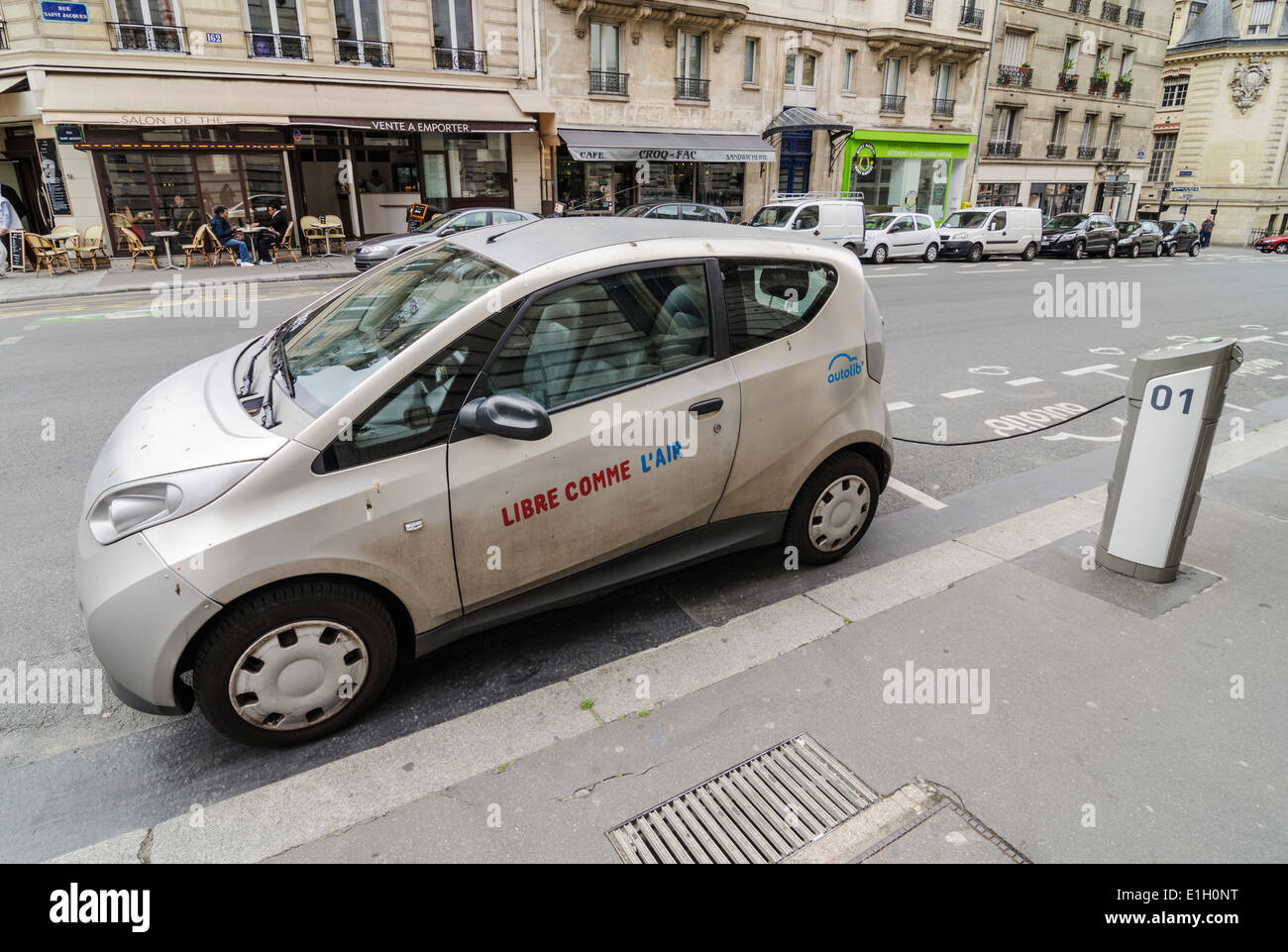 Autolib' Bolloré Bluecar plugged in for recharging,  part of the electric car sharing service in Paris, France Stock Photo