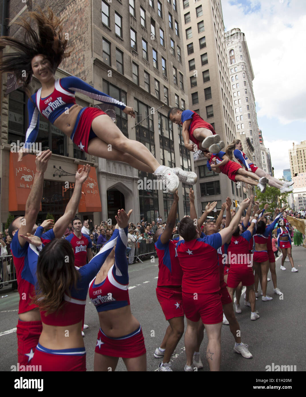 Many different dance groups from many different cultures participate in the NYC Dance Parade on Broadway in Manhattan. Stock Photo