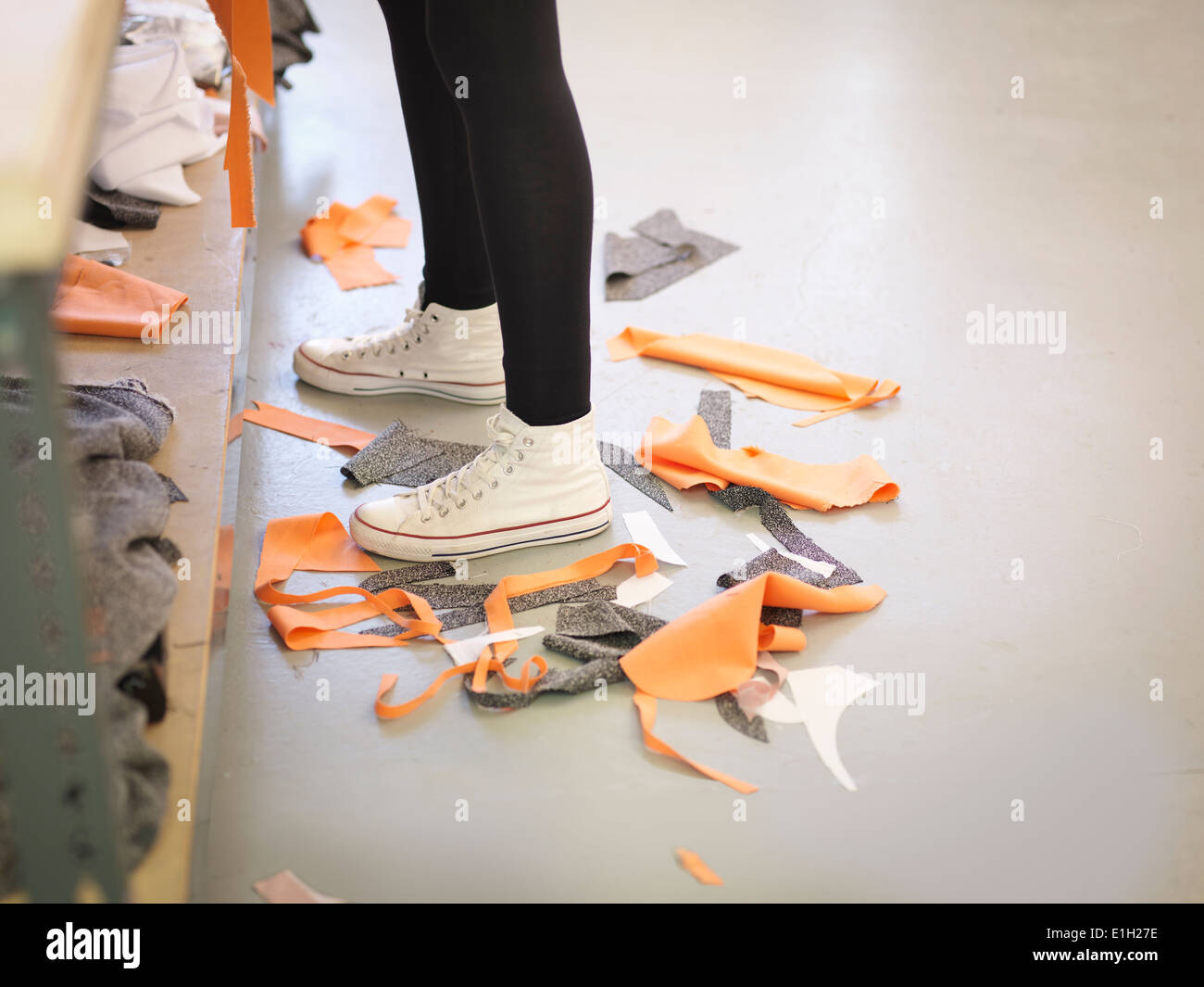 Off-cut material on floor in fashion design studio Stock Photo