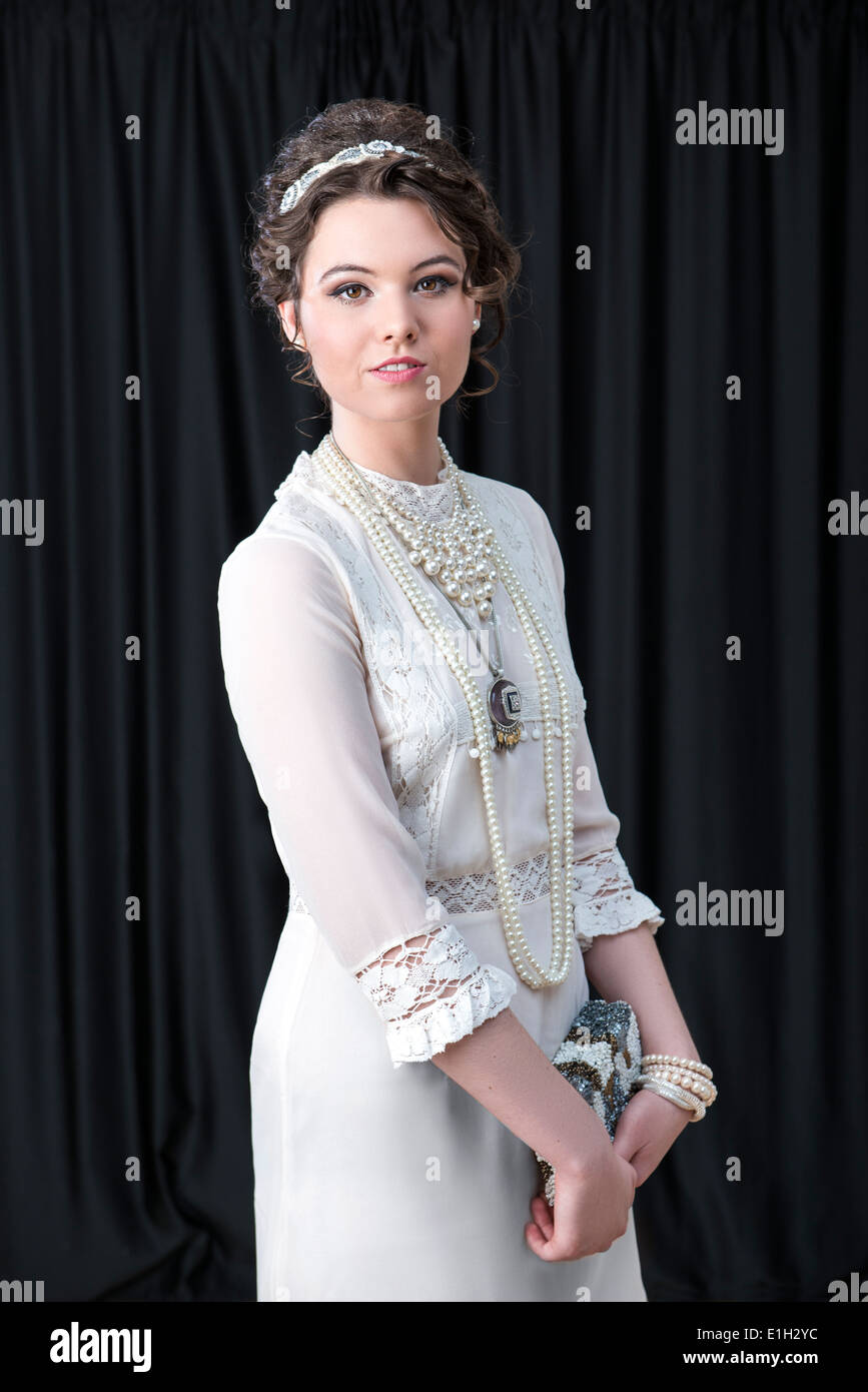 Neo-Victorian model in white dress Stock Photo