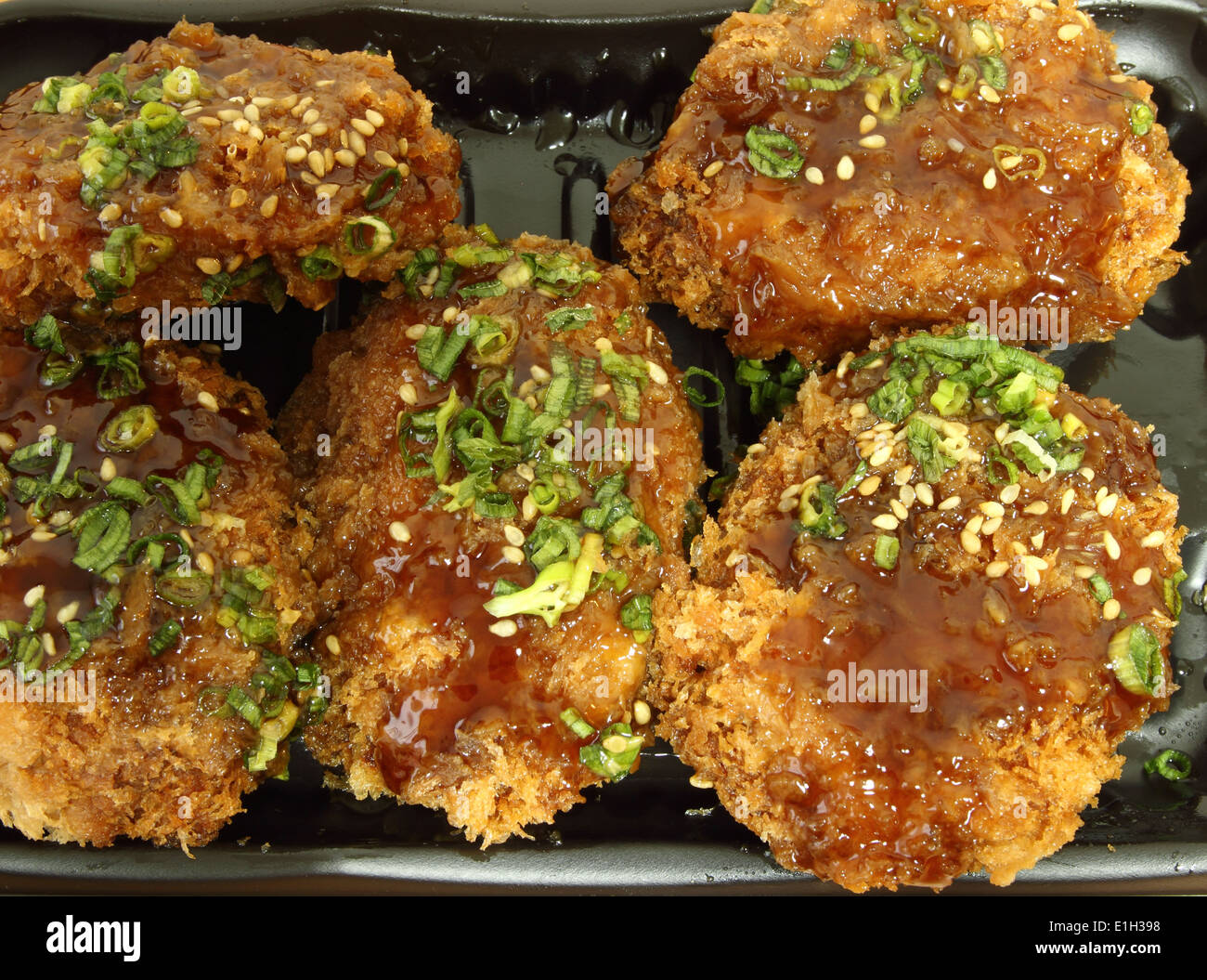 chicken Milanese with Teriyaki sauce Stock Photo