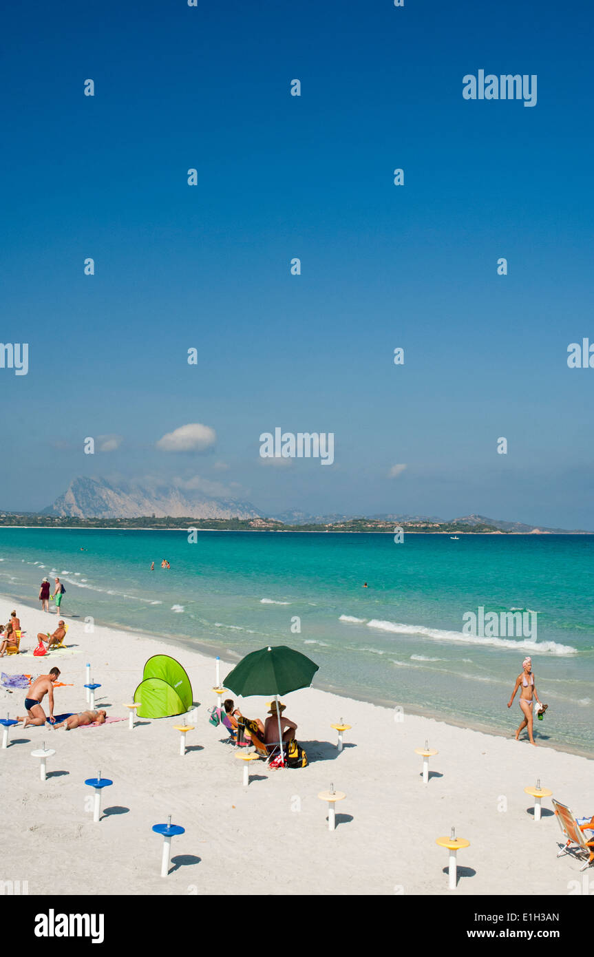 People and tourist enjoy clear water sea at La Cinta beach, San Teodoro, Olbia Tempio province, Sardinia, Italy Stock Photo