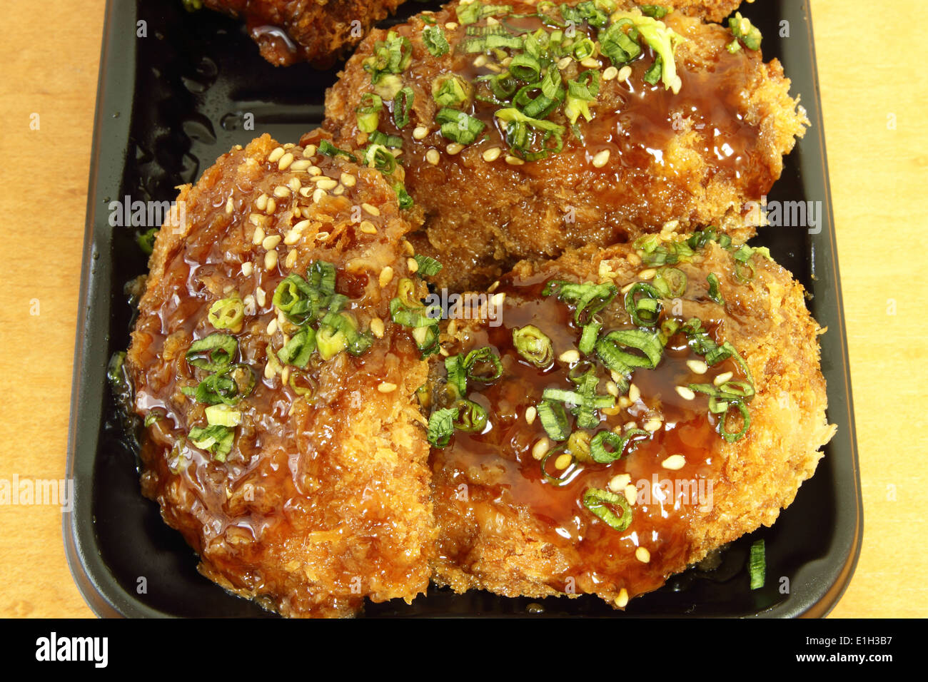 chicken Milanese with Teriyaki sauce Stock Photo