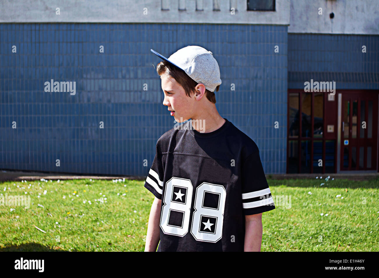 Boy wearing baseball cap hi-res stock photography and images - Alamy