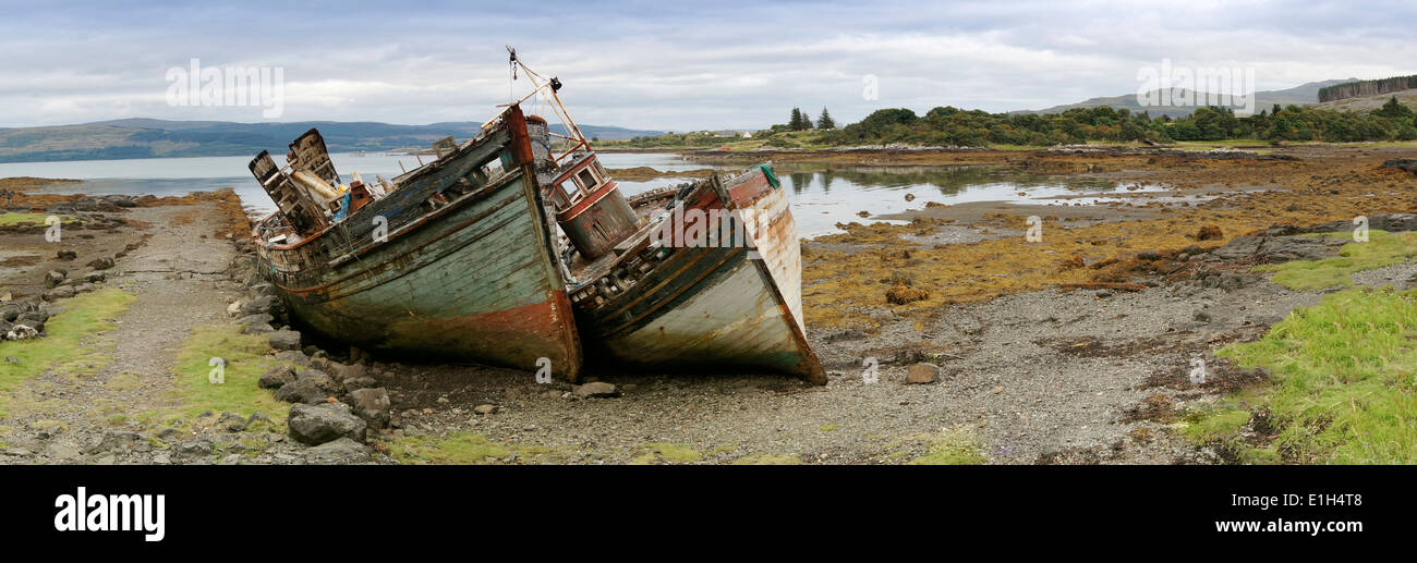Panoramic image of Wrecked Boats Moored in Salen Bay, Isle of Mull, Scotland Stock Photo