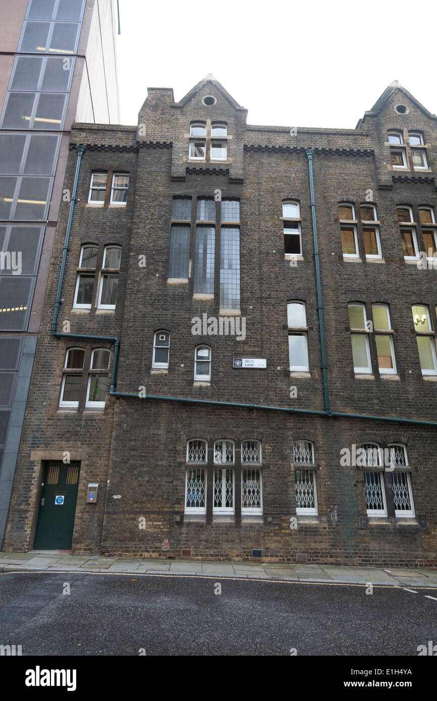 Old buildings next to a new high rise in Shoe Lane, Holborn, London. Stock Photo